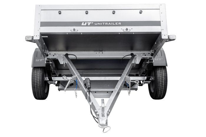 Remorcă auto pe arcuri 230x125 UNITRAILER GARDEN 230/R KIPP cu laterale BIS, cadru H-0 și prelată gri